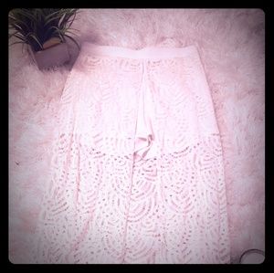 Shorts with lace like overlay